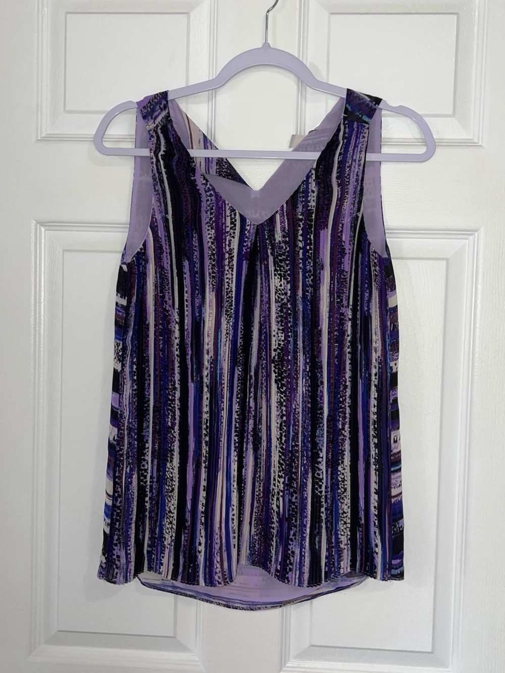 Purple and black flowy sleeveless blouse